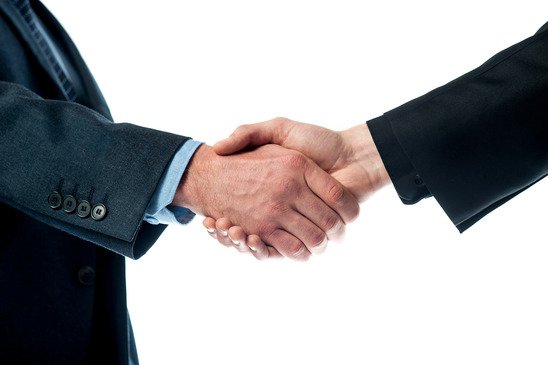 Two business men shaking hands